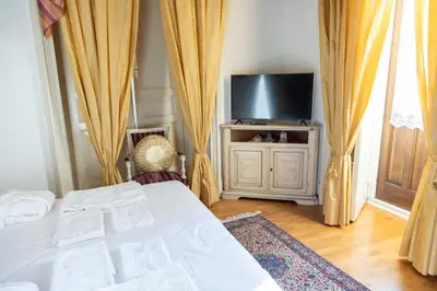 TV o dispositivi per l'intrattenimento presso Euplio Luxury Apartment