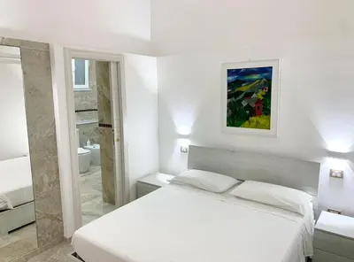 Letto o letti in una camera di Giorgi Lux