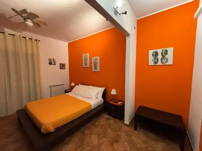Letto o letti in una camera di OPUNTIA DELL'ETNA BIKE HOUSE