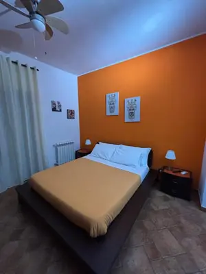 Letto o letti in una camera di OPUNTIA DELL'ETNA BIKE HOUSE