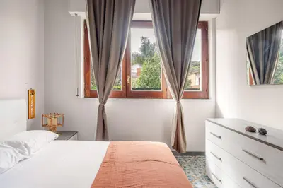 Letto o letti in una camera di PRAIOLA BEACH HOUSE