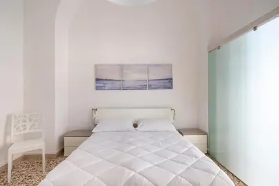 Letto o letti in una camera di GuestHost - Cilea Central Apt a few steps from the Station