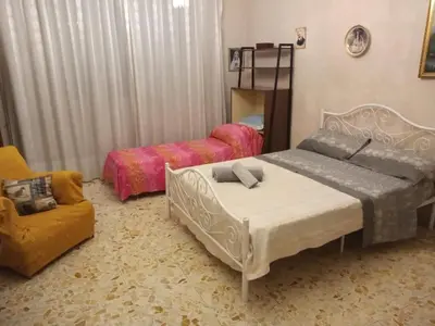 Letto o letti in una camera di B&B Viale Liberta Giarre (CT)