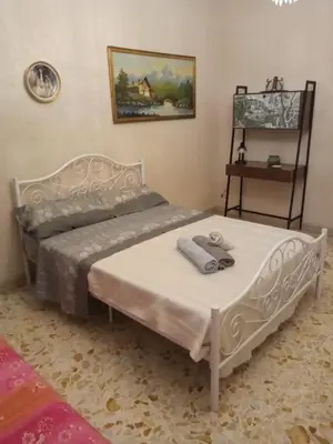 Letto o letti in una camera di B&B Viale Liberta Giarre (CT)