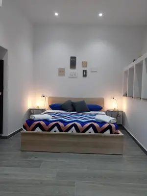 Letto o letti in una camera di Apartment Melograno5