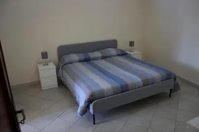 Letto o letti in una camera di Casa Contemare