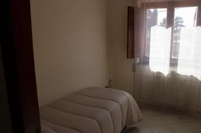 Letto o letti in una camera di Casa Contemare