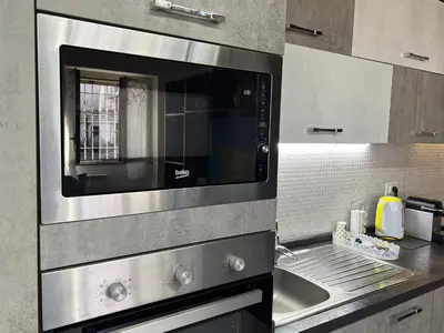 Cucina o angolo cottura di Li Cuti House - Lungomare Self Check-in