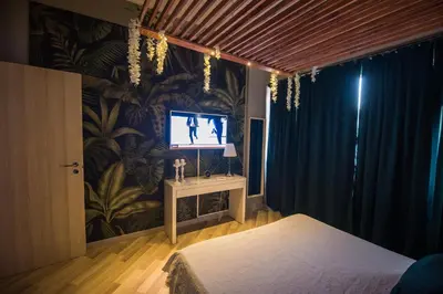 Letto o letti in una camera di Samsara & Nirvana Suites Apartment