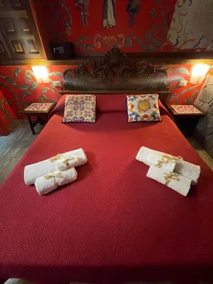 Letto o letti in una camera di Catania Sicula Folk