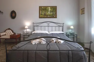 Letto o letti in una camera di Aci B&B
