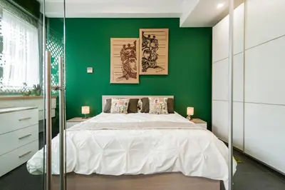Letto o letti in una camera di Central Green House