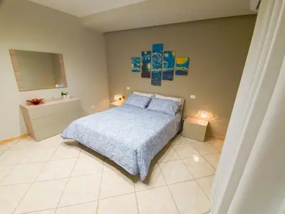 Letto o letti in una camera di Montalbano Sweet Home