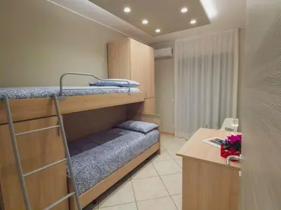 Letto o letti in una camera di Montalbano Sweet Home