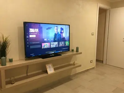 TV o dispositivi per l'intrattenimento presso Holiday house katanè