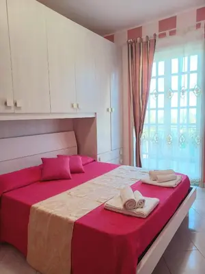 Letto o letti in una camera di CasaEtnaMarty Acireale