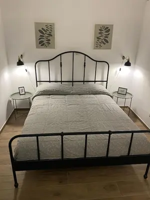 Letto o letti in una camera di Cortile Mongibello