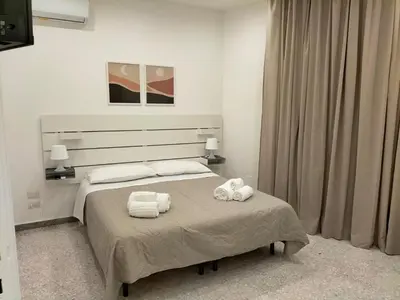 Letto o letti in una camera di Cuore di Aci - Casa Marconi