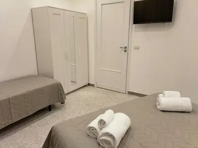Letto o letti in una camera di Cuore di Aci - Casa Marconi
