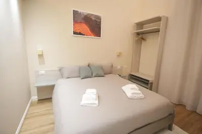 Letto o letti in una camera di Etna Vibes Home