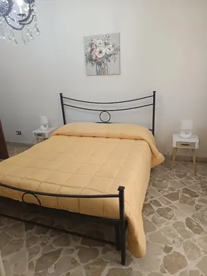 Letto o letti in una camera di New Dawn Apartment, Appartamento Turistico, casa per vacanza, tre camere indipendenti