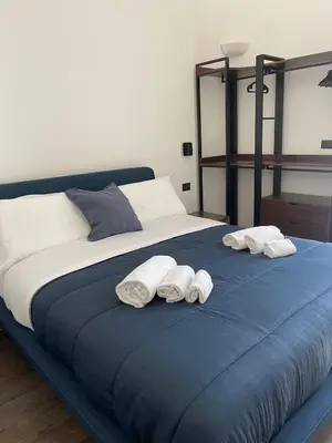 Letto o letti in una camera di SiSTO18