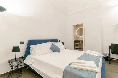 Letto o letti in una camera di SiSTO18