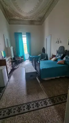 Letto o letti in una camera di B& B Cà de Andreas