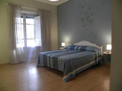 Letto o letti in una camera di CASA GORIZIA 63