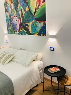 Letto o letti in una camera di Lavica Di Mezzo Apartments