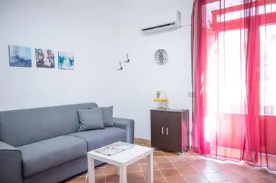 Area soggiorno di Esperia Holiday House