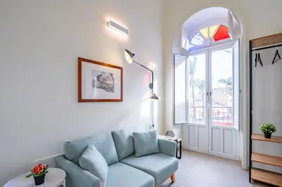 Area soggiorno di GuestHost - Seaview Modern Apartment with Balcony