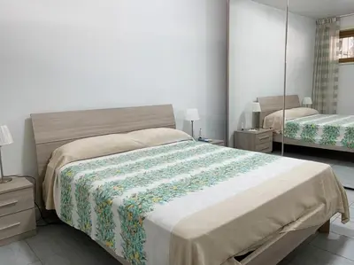 Letto o letti in una camera di Reef house loft