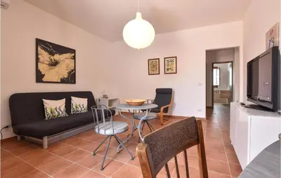 TV o dispositivi per l'intrattenimento presso Lovely Home In Santa Venerina With Wifi