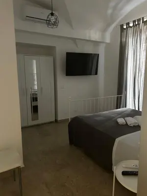 Letto o letti in una camera di G house 100
