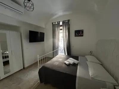 Letto o letti in una camera di G house 100