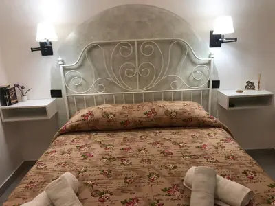 Letto o letti in una camera di Casa Vacanza Nina 17