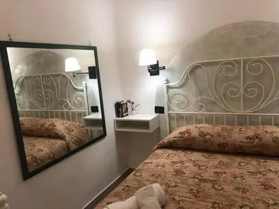 Letto o letti in una camera di Casa Vacanza Nina 17