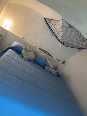 Letto o letti in una camera di Casa vacanza nina