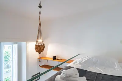 Letto o letti in una camera di GuestHost - Corso Italia Central Flat near the Seafront