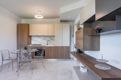 Cucina o angolo cottura di GuestHost - Lovely Flat with Balcony and Private Parking