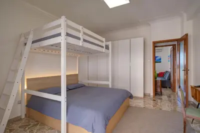 Letto o letti in una camera di Top Floor Aparthotel Bentivoglio