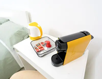 Letto o letti in una camera di Be happy Rooms
