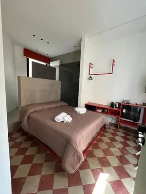 Letto o letti in una camera di Polpetthouse