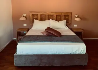 Letto o letti in una camera di PetraSicula Apartment