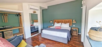 Letto o letti in una camera di PetraSicula Apartment