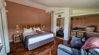 Letto o letti in una camera di PetraSicula Apartment