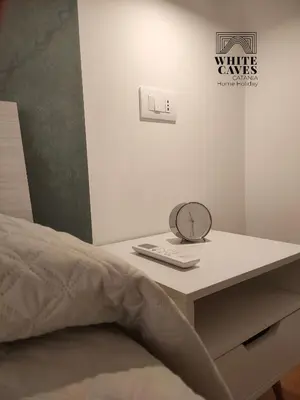 Letto o letti in una camera di White Caves Catania Apartment
