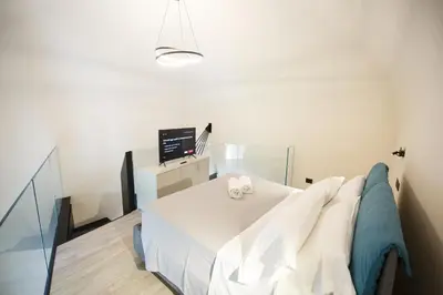 Letto o letti in una camera di MAZZINI PALACE